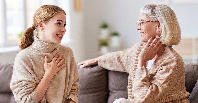 Older and younger woman talking
