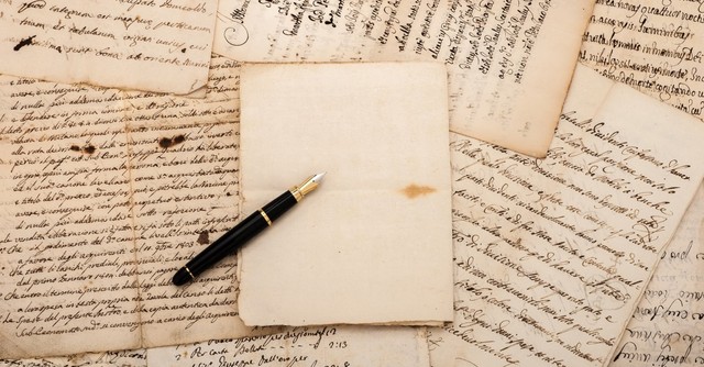 fountain pen on antique letters