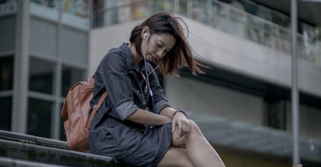 a woman with headphones