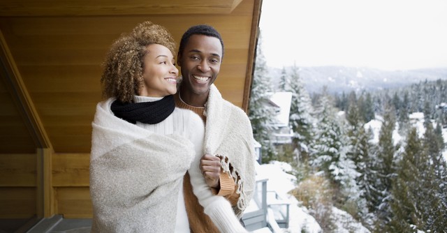 Happy cozy couple in snow