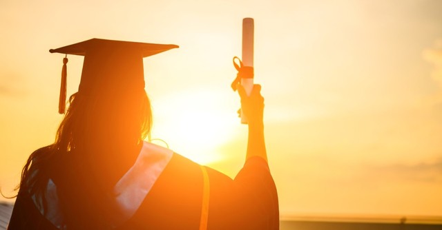 college graduate with sunshine background