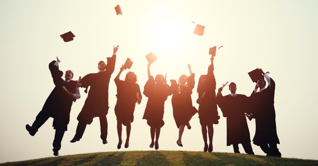 cheering college graduates
