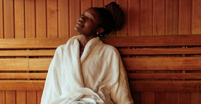 Peaceful woman relaxing at spa