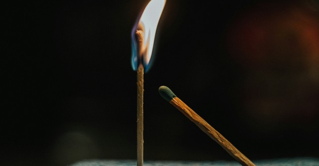 A burning match and an unlit match