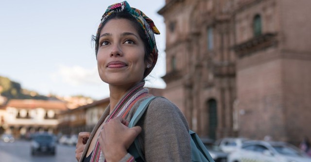 Woman looking up, smiling