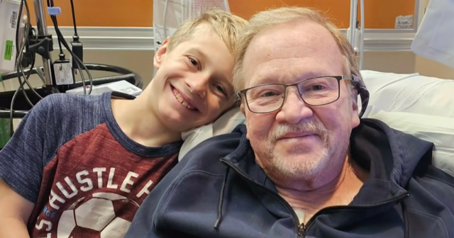 A young boy with his pastor in the hospital