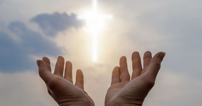 hands lifted toward a cross in the sky, what is contemplative prayer