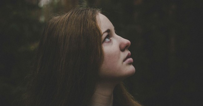 woman looking up to God