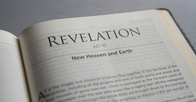 Bible open to book of Revelation