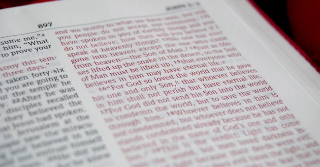 closeup of John 3-16 in an open Bible