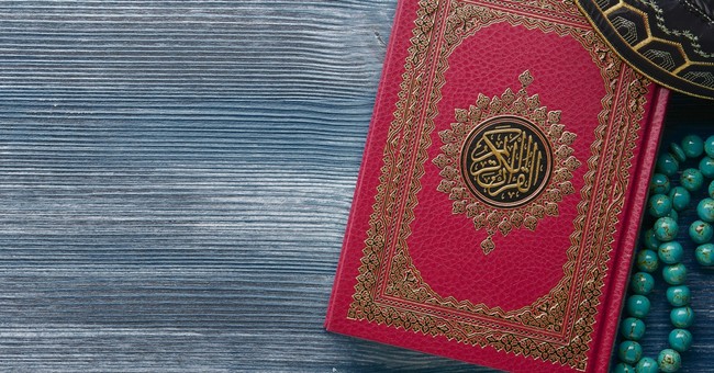 Quran with rosary beads