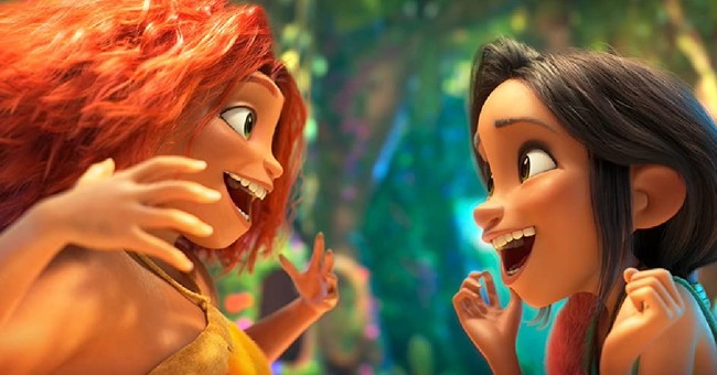 A animated boy and girl smiling at each other in The Croods, The Croods
