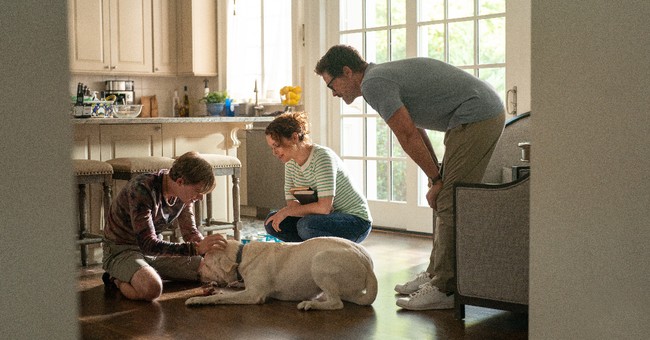 family with their dog