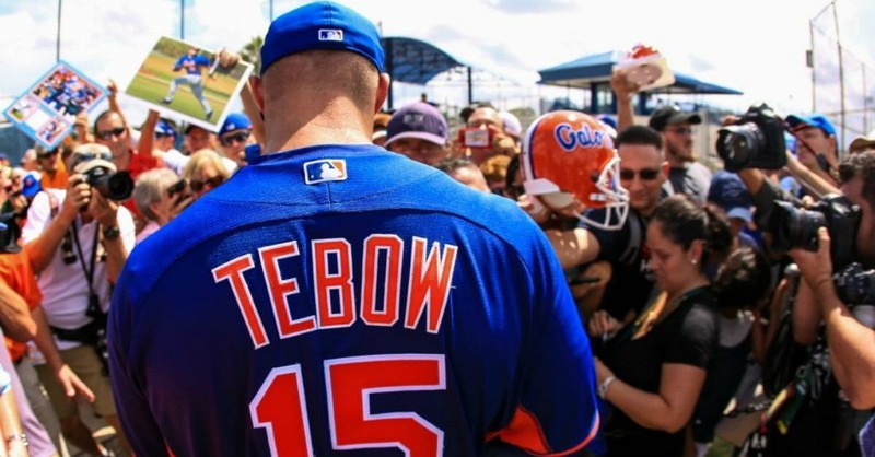 Jerseys worn by Tim Tebow fans commemorate the various phases of his  athletic career