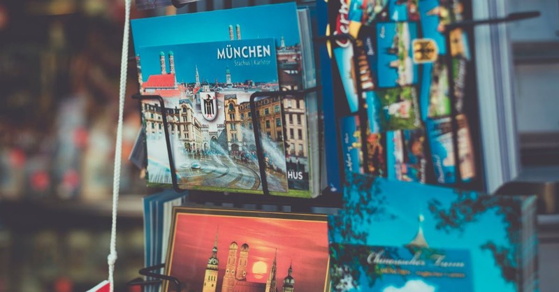 6. Write letters or send postcards to friends when you are out of town