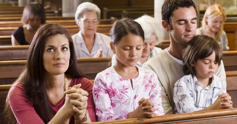 family going to church together