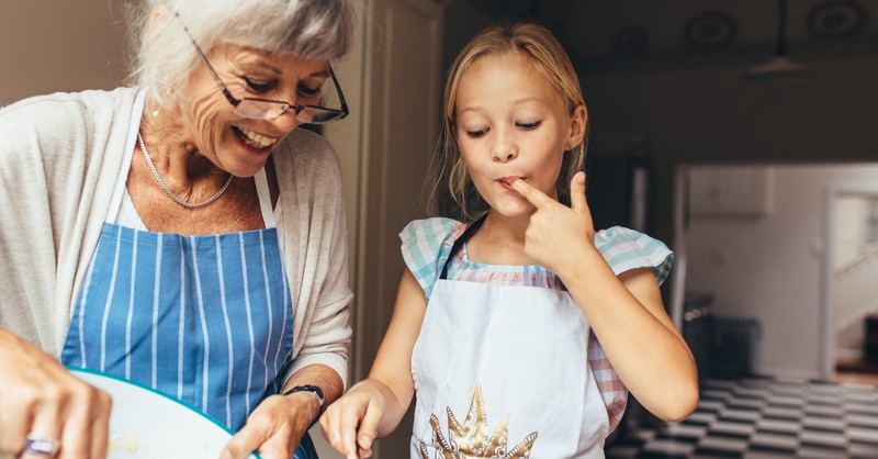 grandmother baking with granddaughter