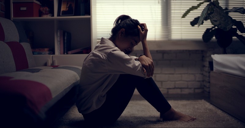 Woman alone in her apartment