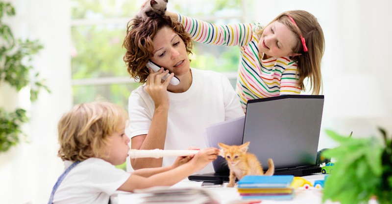 busy mom working from home with kids