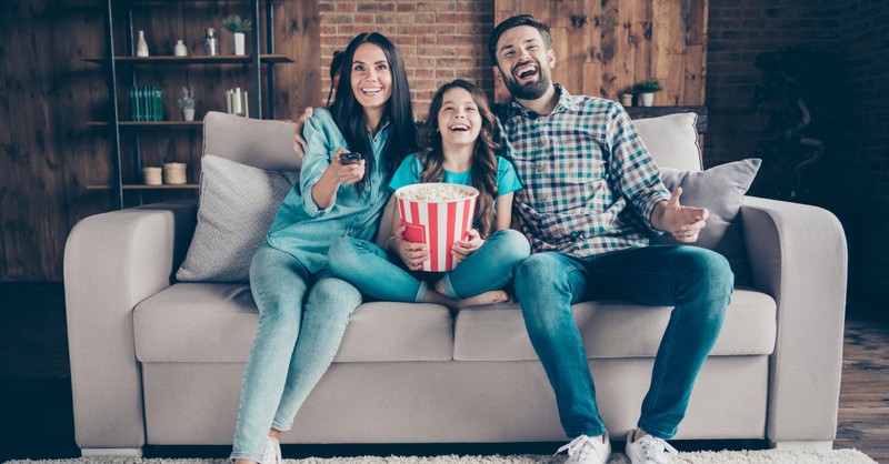 A family watching TV, streaming is up by 300 on Netflix and Disney+