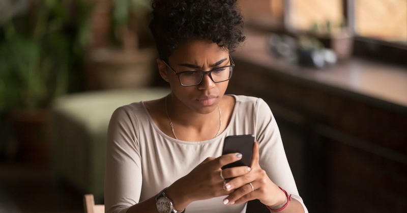 frustrated woman looking at phone, prayers to check your heart