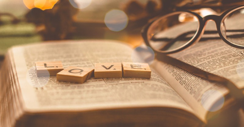 Love scrabble pieces on a Bible, is it a sin to question god