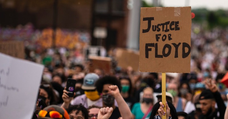 Justice for Floyd sign, Four officers are fired after a black man dies while in custody