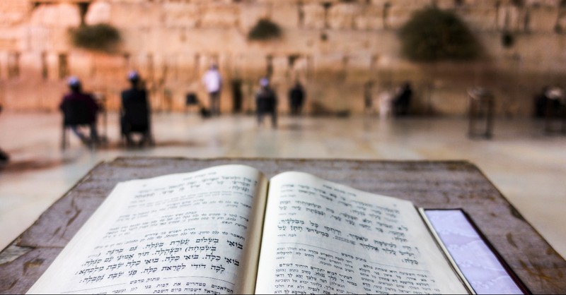 Torah opened in front of the Western Wall in Jerusalem