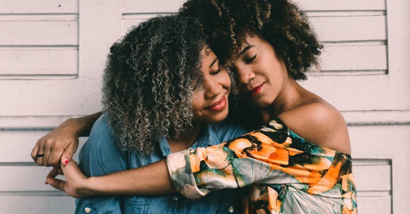 two young women hugging, relationships dysfunction