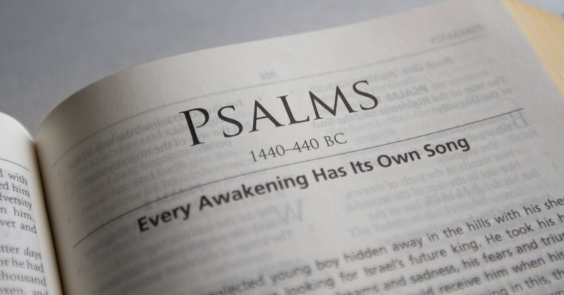 Bible open to the Psalms title page, a psalm that leads to unhurried serenity and peace and power