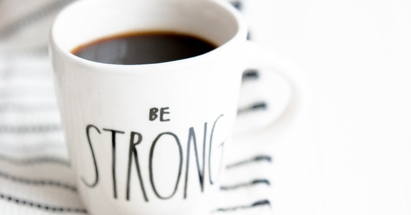 Coffee cup saying Be Strong