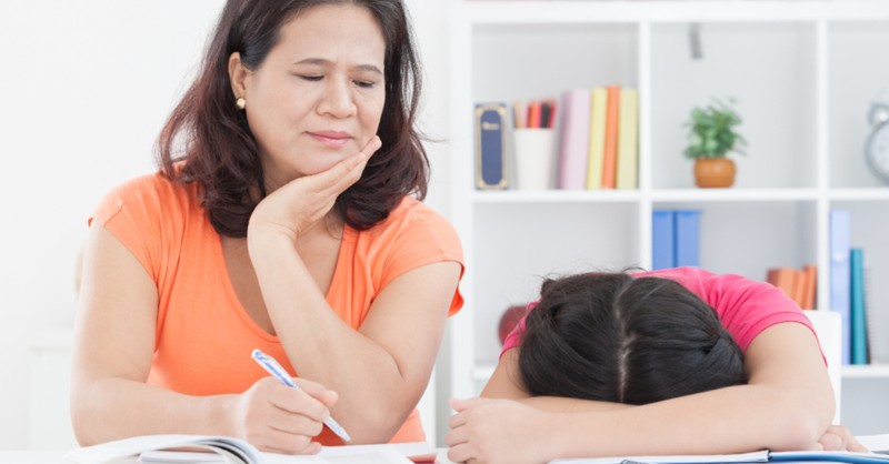 mom homeschooling with frustrated kid