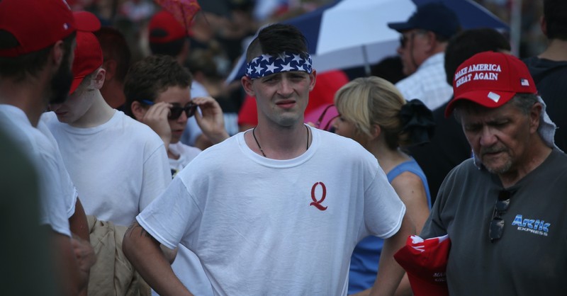 Man in a QAnon shirt, A growing number of political leaders have warned about the Influence of QAnon