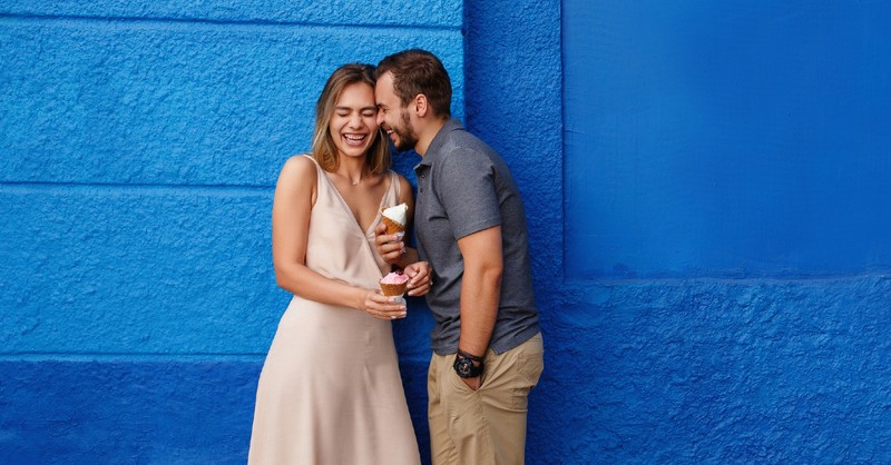 couple smiling eating ice cream