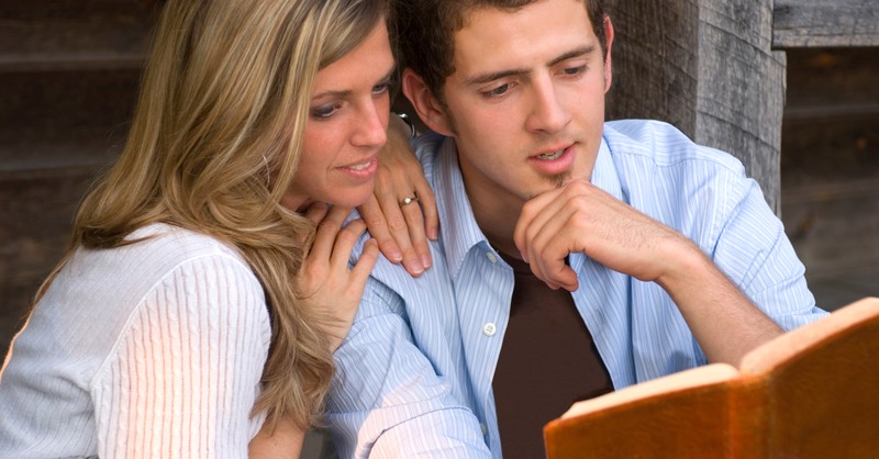 couple reading the bible together