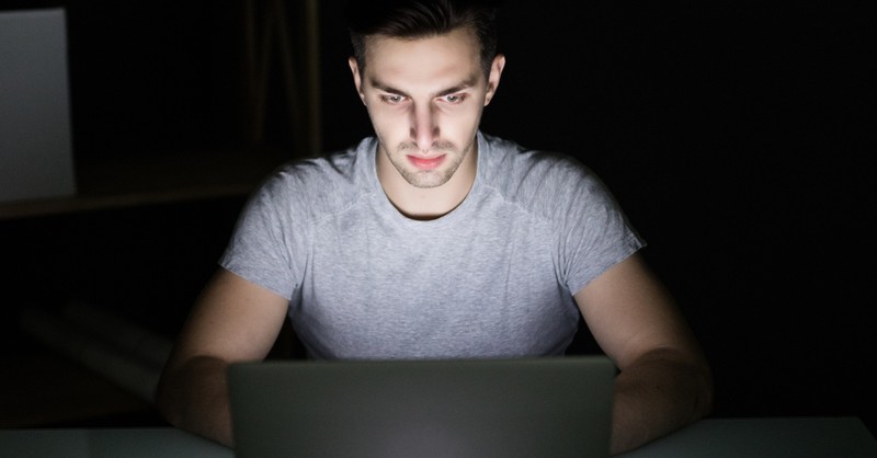 man on laptop late at night watching porn, is porn a sin