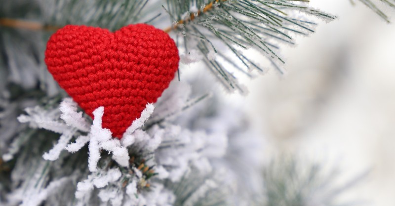 crocheted heart decoration in a christmas tree