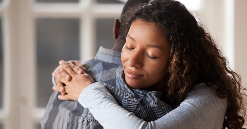 happy couple embracing in hug, marriage restoration