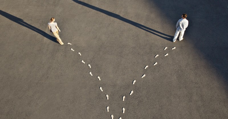 man and woman walking in separate directions, warning signs of the jezebel spirit