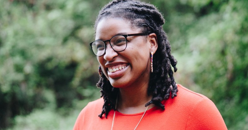 woman smiling looking happy and confident