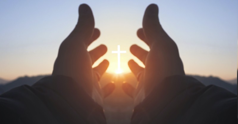 hands holding a cross, I can do all things through Christ