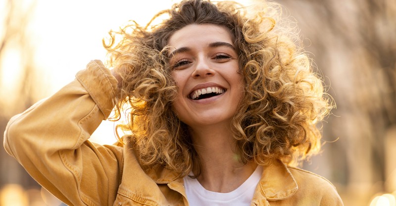 woman smiling and laughing, inspirational bible verses