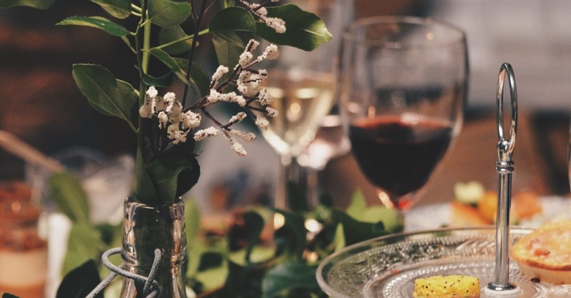 wedding feast laid out on table with wine