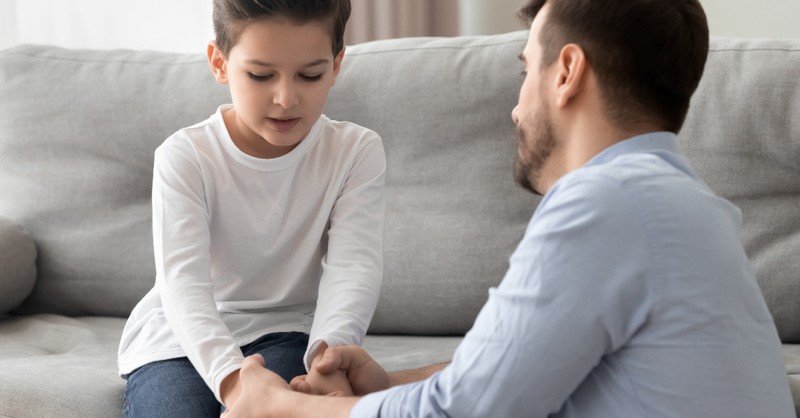 son and dad having serious talk conversation