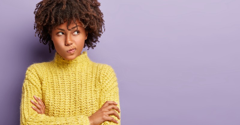 woman thinking purple background, what is an agnostic