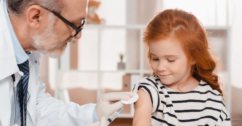 A young girl getting a shot, Connecticut House approves bill to end religious vaccine exemption
