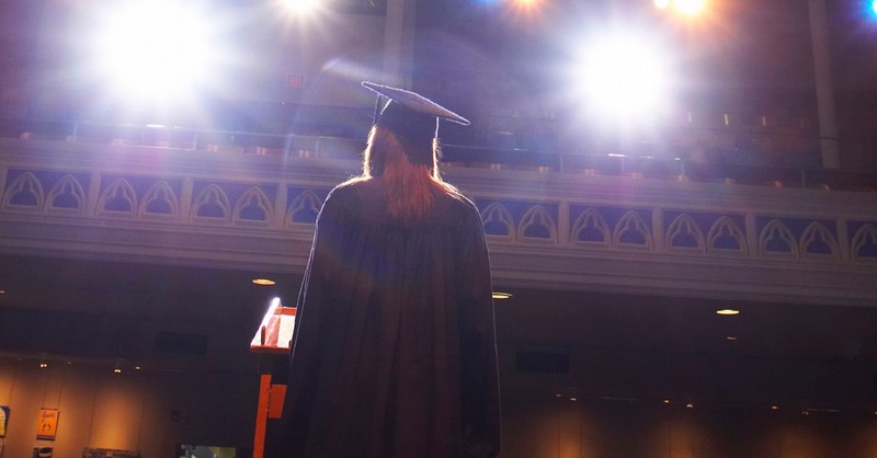 A woman speaking at a graduation, Graduate denounces Texas' heartbeat abortion ban in valedictorian speech