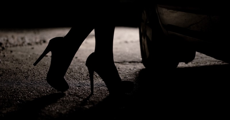 a woman in a pair of heels, should prostitution be legal?