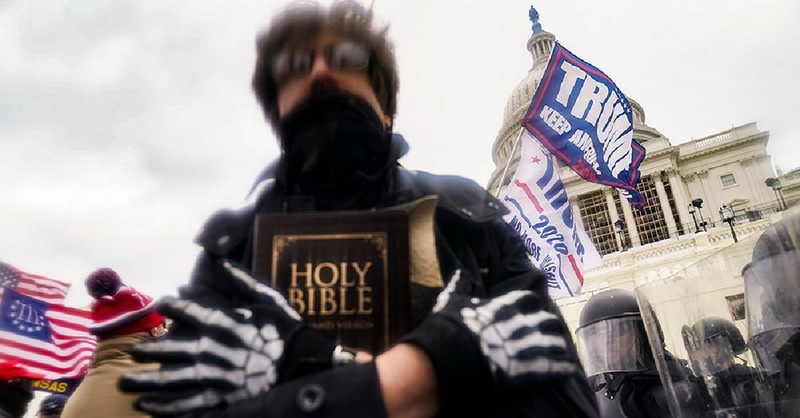 A man at the capitol insurrection holding a Bible, what is Christian nationalism