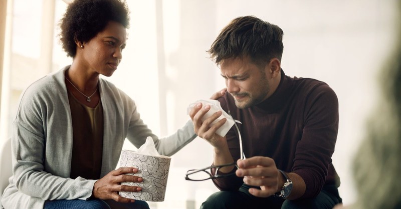 Man crying in a support group